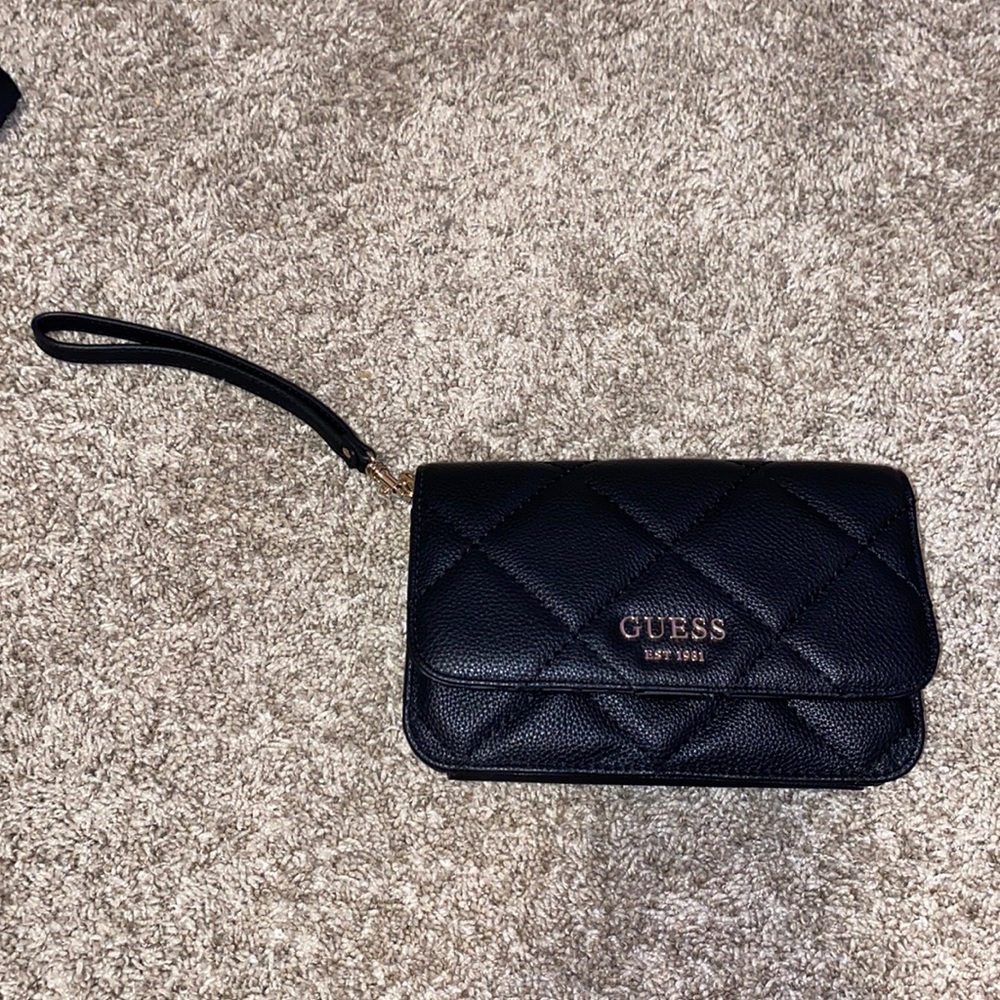 Guess Black Wristlet Bag.    Color: Black.  Brand: Guess New condition